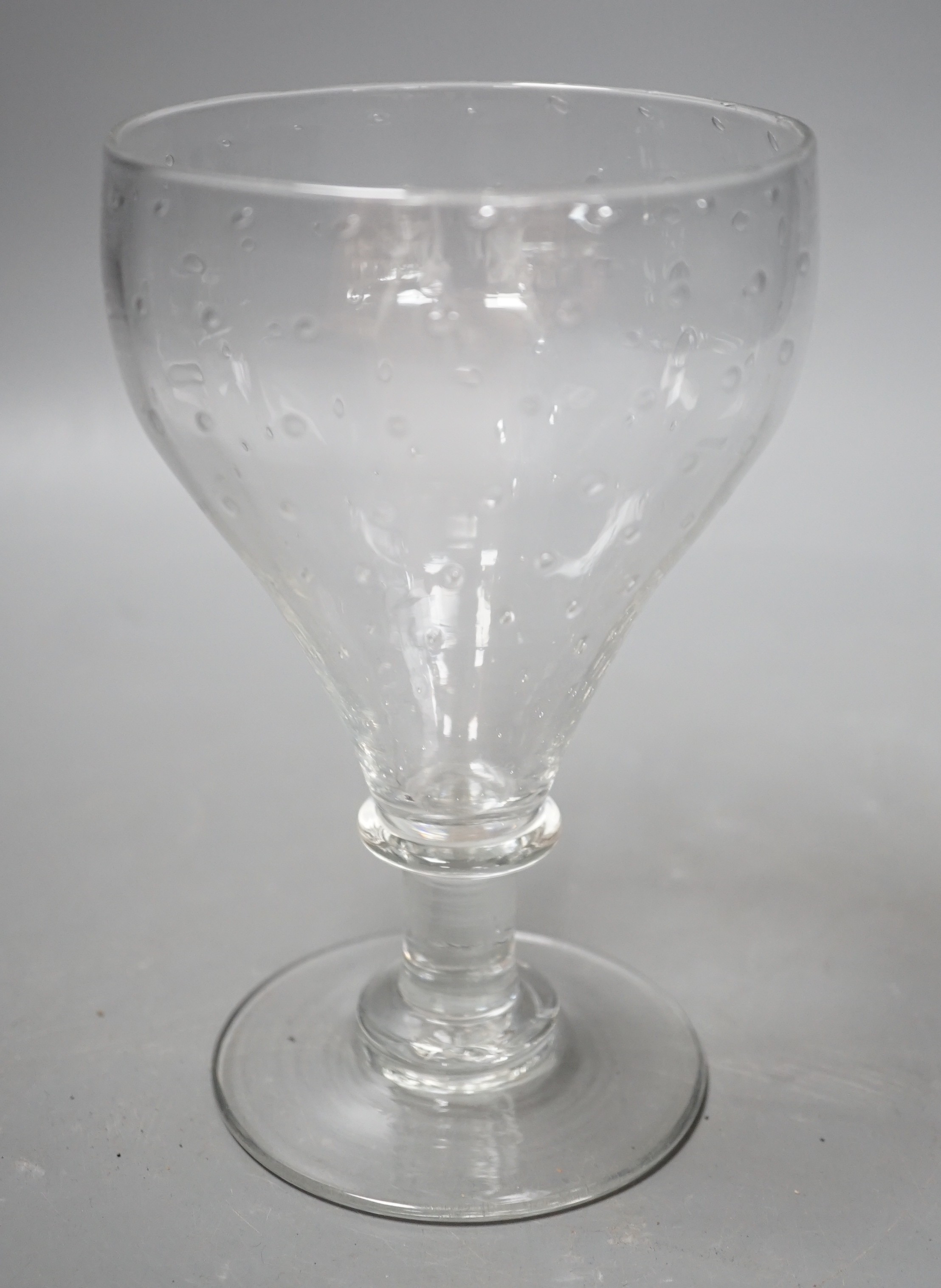 A unusual glass rummer, with a pattern of bubble inclusions to the bowl. 16cm high